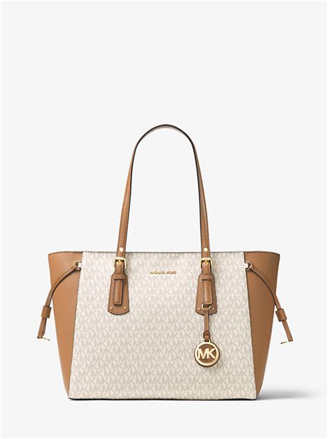 michael kors voyager medium logo mixed-media tote bag|Michael Kors Tote with zipper.